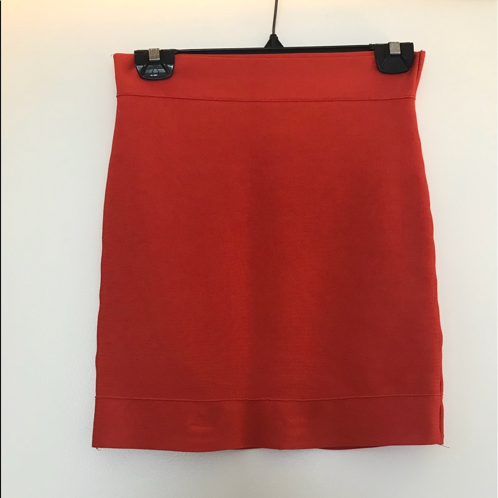 A beautiful BCBG orange mini skirt